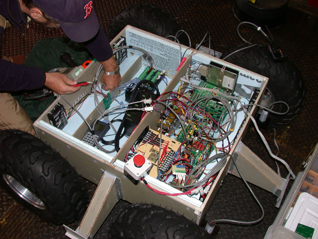 the interior is a rat's nest of wires and circuit boards 